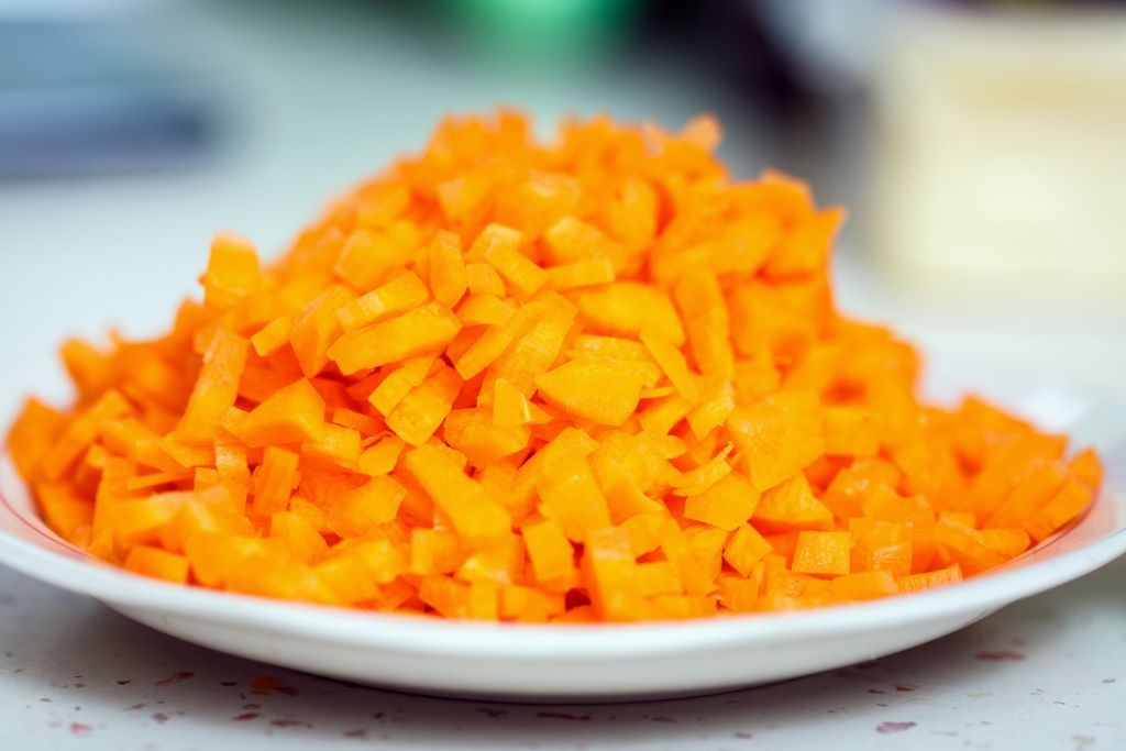 sliced carrot on white plate